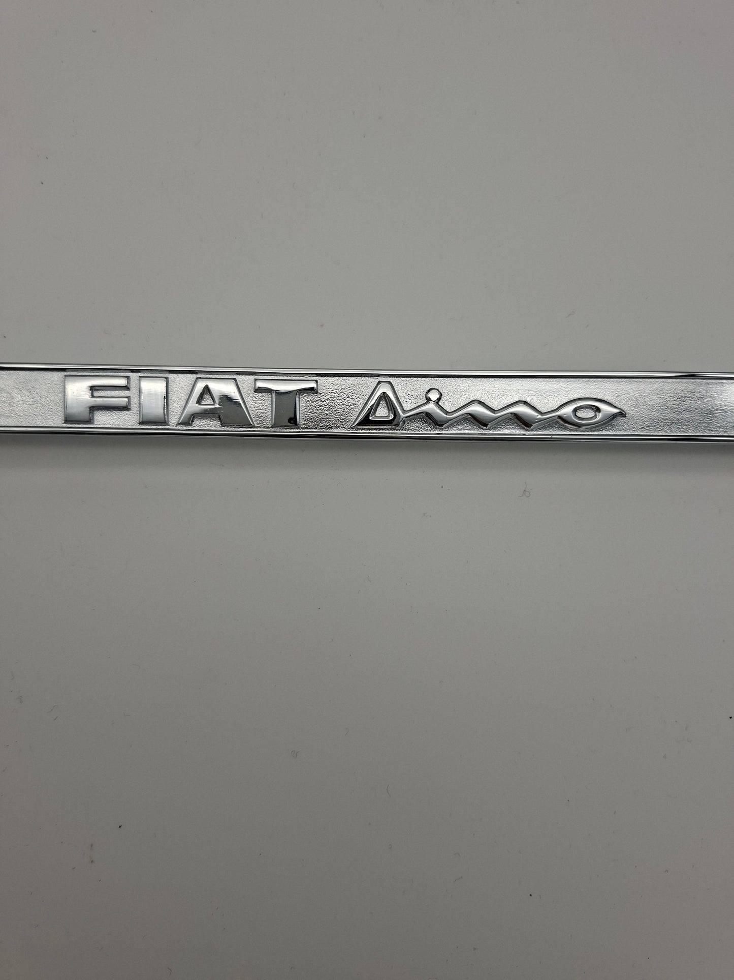Fiat Dino Schriftzug Kotflügel, massiv Messing, neu verchromt
